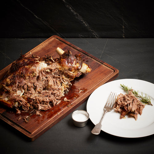 Slow cooked lamb shoulder with anchovies, garlic and rosemary