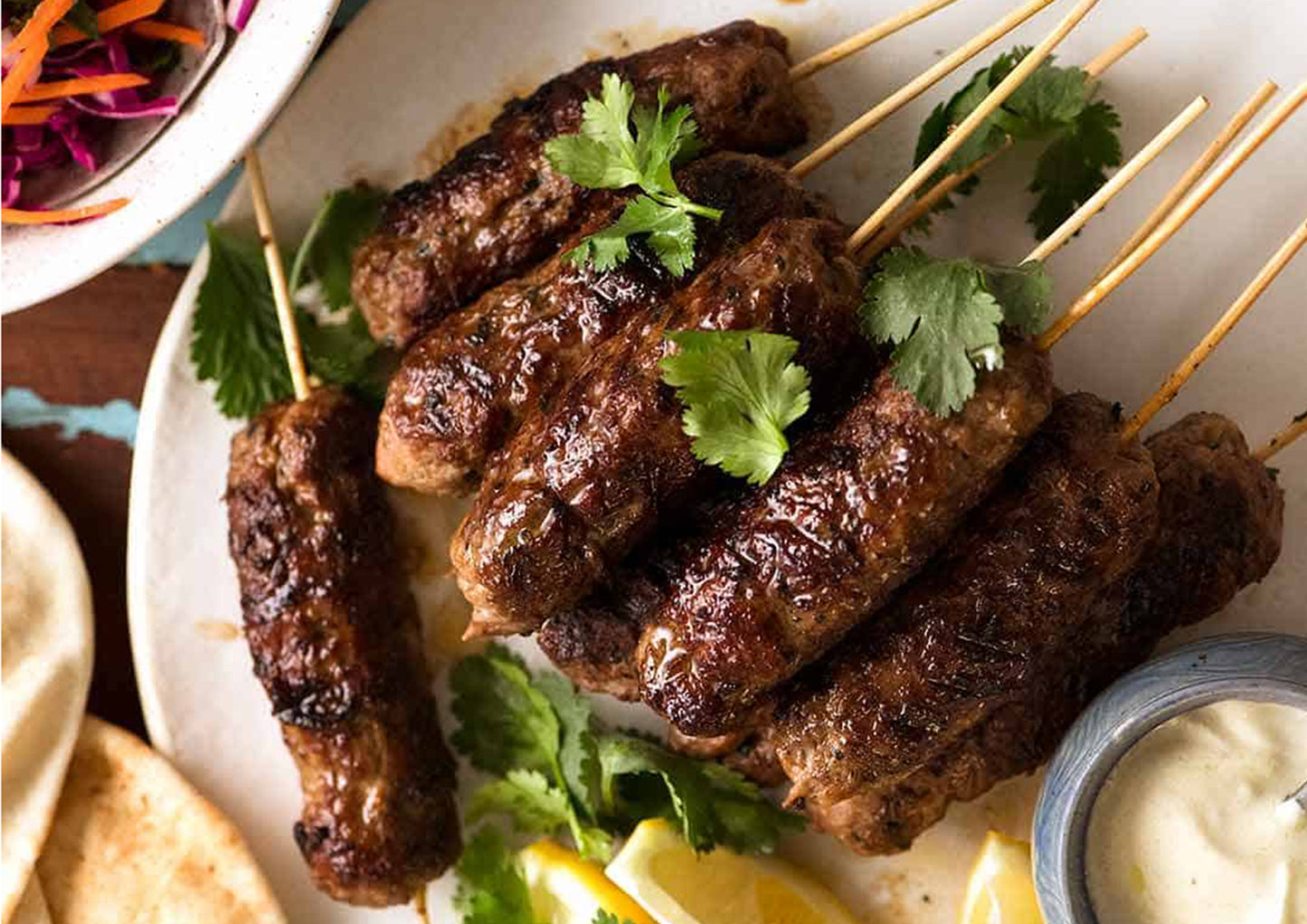 Chef Nick Sandler's Lamb Kofta - Served in flatbread with tzatziki