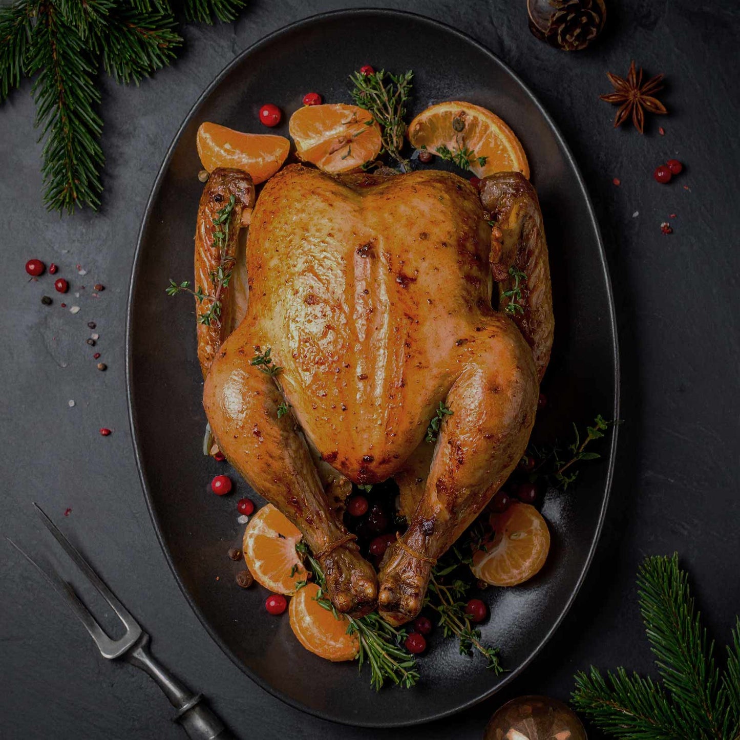 Roast Christmas turkey with clementines and thyme