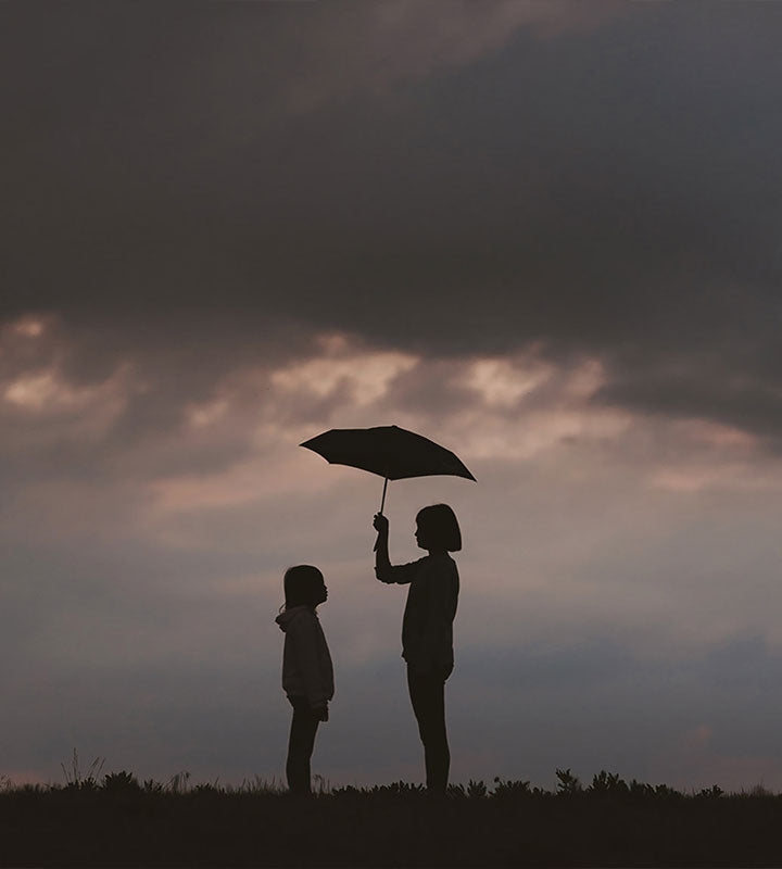 sisters with an umbrella
